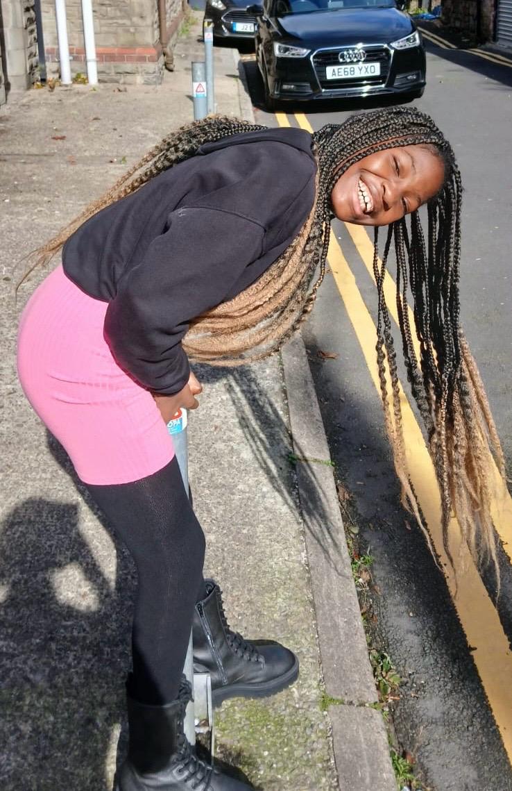 Client showing off a premium Desmart hair styling result